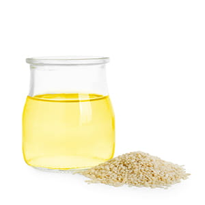 Sesamöl Sesamöl in einem Glas uns Sesamsamen